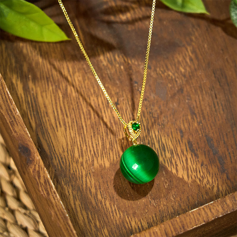 Buddha Stones Collana con ciondolo a forma di palla rotonda con occhio di gatto e simbolo di fiducia - image 14