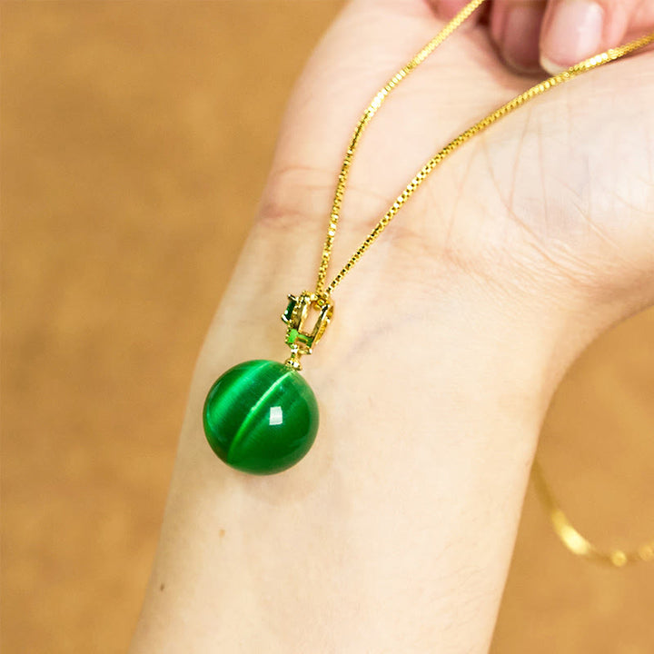Buddha Stones Collana con ciondolo a forma di palla rotonda con occhio di gatto e simbolo di fiducia - image 17