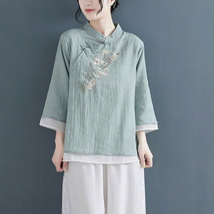Camicia da donna in cotone e lino con collo alla coreana, maniche a tre quarti, ricamo a fiori con Buddha Stones e bottoni a rana