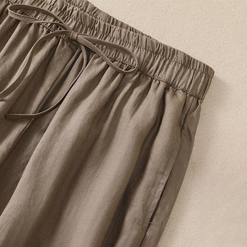 Pantaloni harem da donna in lino di cotone con coulisse e bottoni a rana, con tasche, di colore puro, Buddha Stones