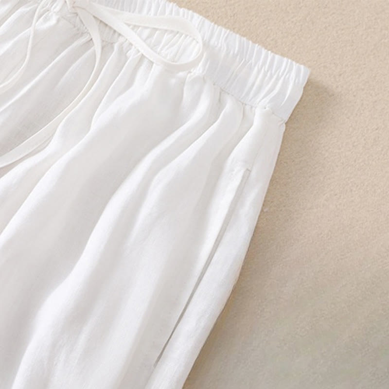 Pantaloni harem da donna in lino di cotone con coulisse e bottoni a rana, con tasche, di colore puro, Buddha Stones
