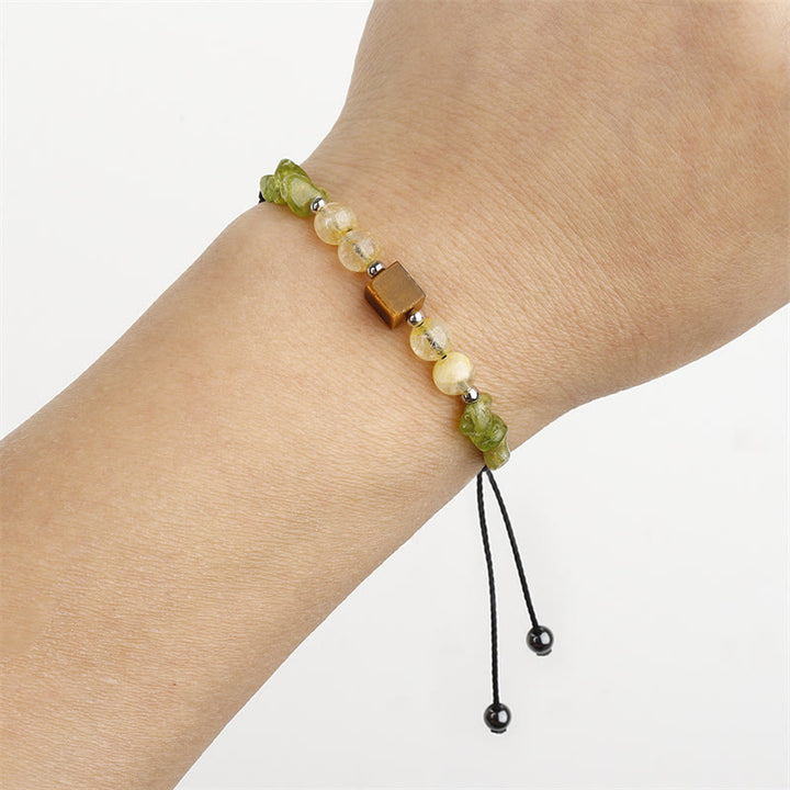 Buddha Stones Trova la tua gioia Braccialetto in corda della pace con peridoto, citrino, occhio di tigre