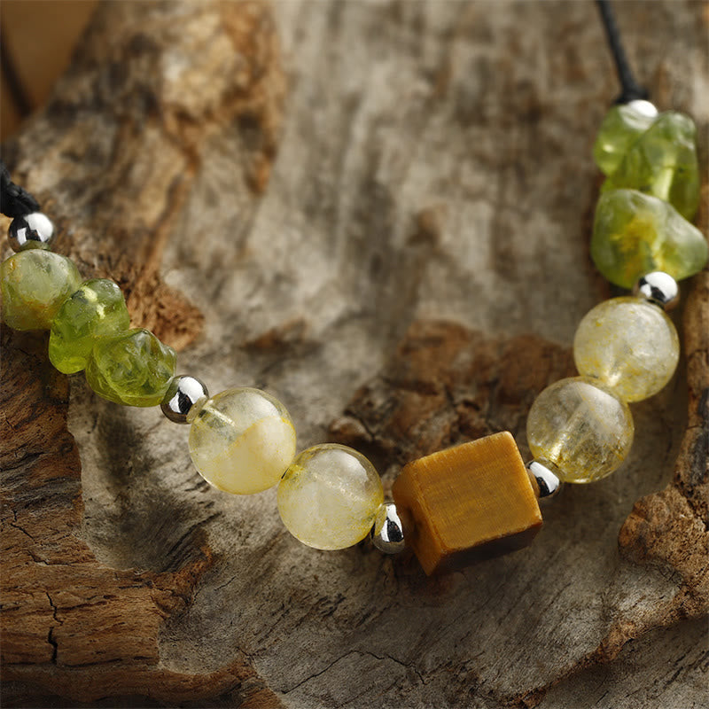 Buddha Stones Trova la tua gioia Braccialetto in corda della pace con peridoto, citrino, occhio di tigre