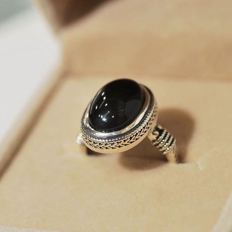 Anello di protezione regolabile in onice nero naturale Buddha Stones