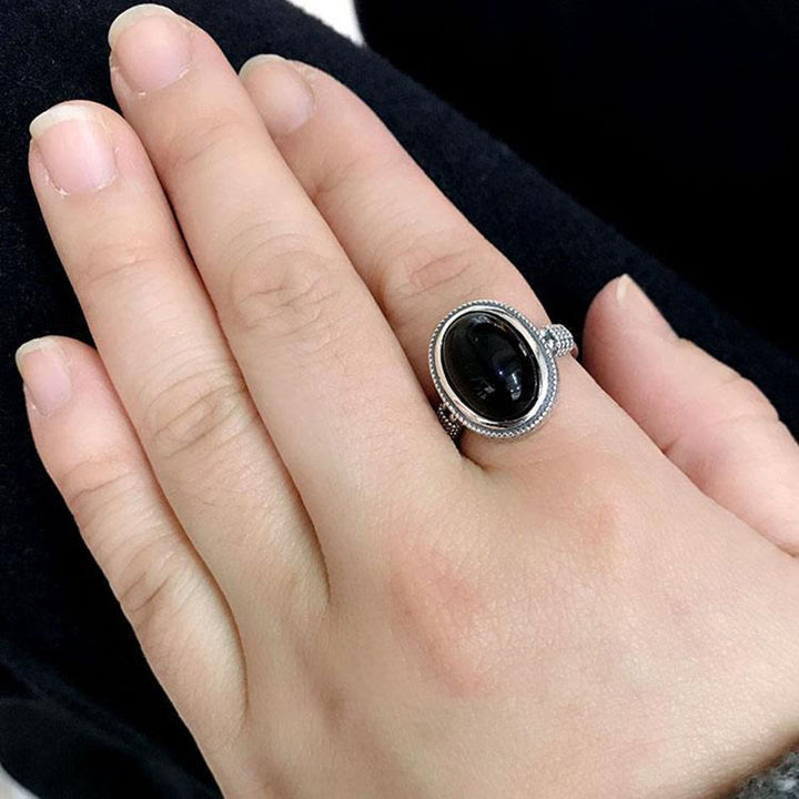 Anello di protezione regolabile in onice nero naturale Buddha Stones