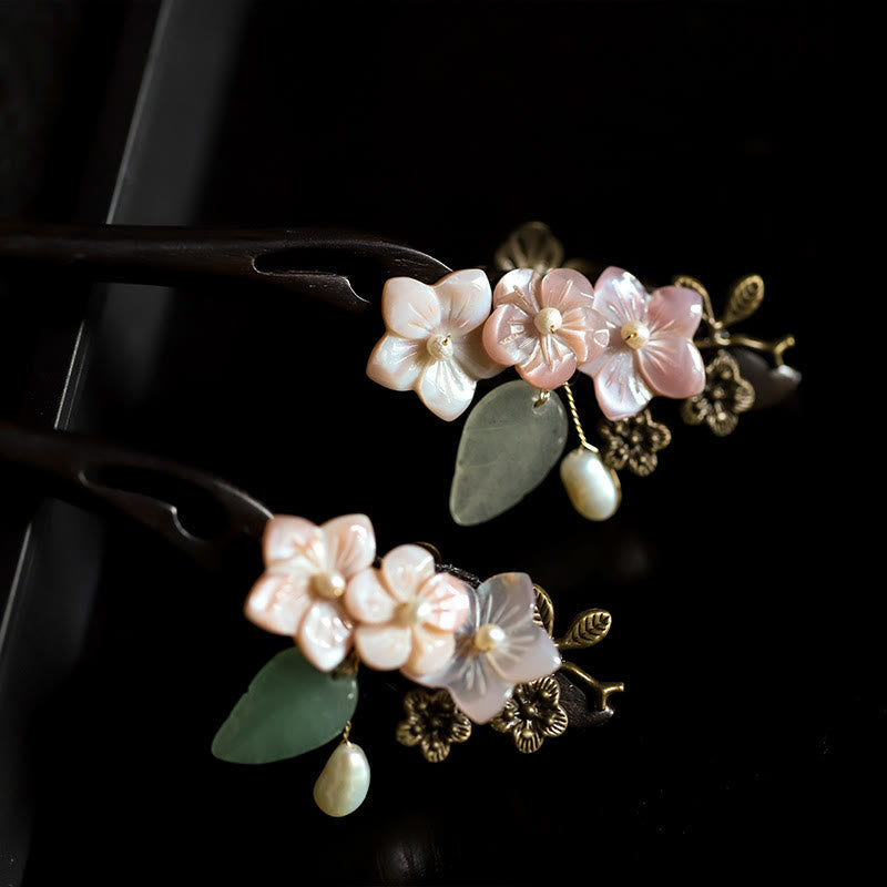 Forcina per capelli con foglie di fiori di conchiglia di ebano Buddha Stones