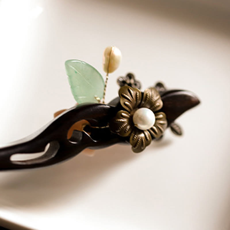 Forcina per capelli con foglie di fiori di conchiglia di ebano Buddha Stones