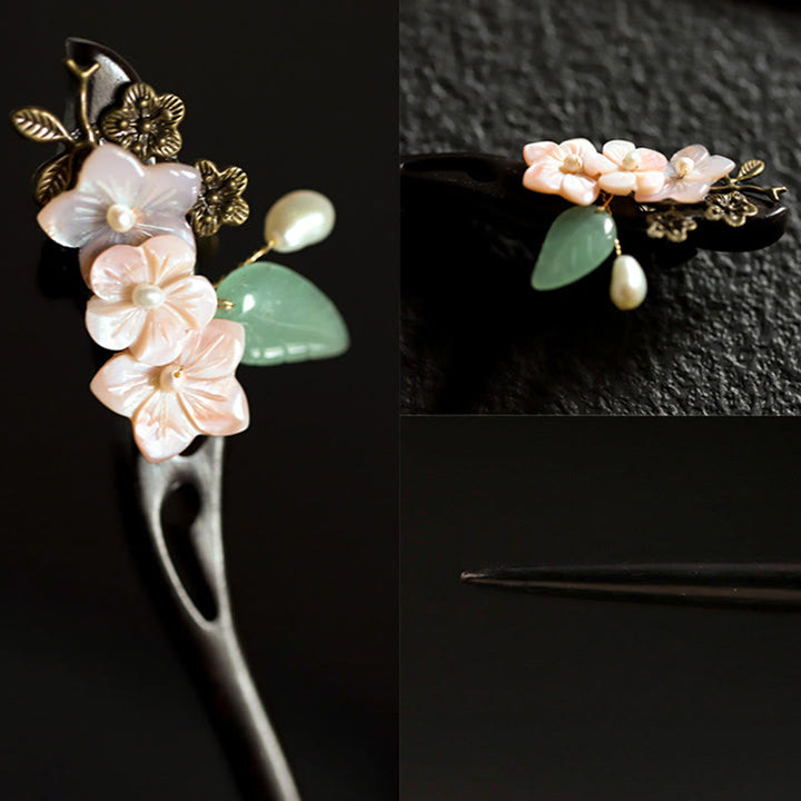 Forcina per capelli con foglie di fiori di conchiglia di ebano Buddha Stones