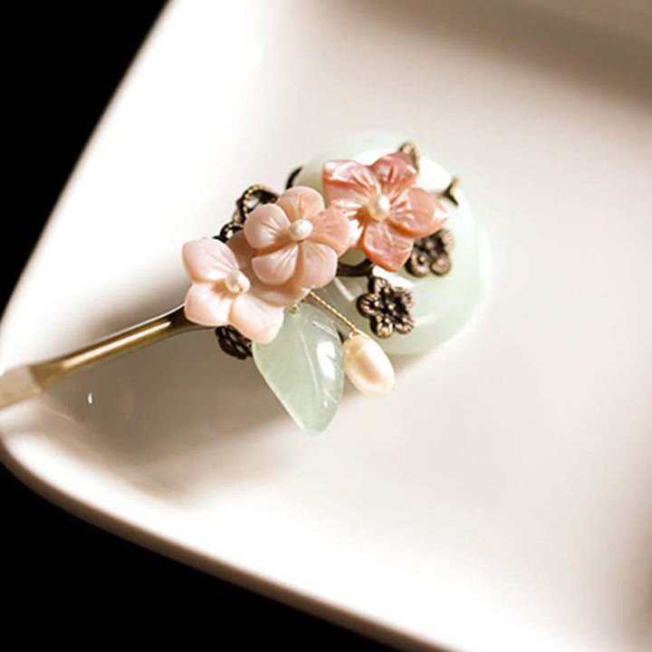 Buddha Stones, rame, giada, conchiglia, fiore, foglie, forcina per capelli