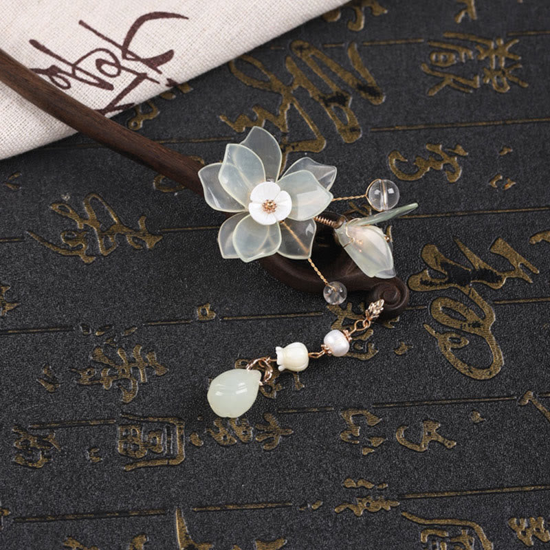 Forcina per capelli con nappa di magnolia, conchiglia, giada e pietre Buddha Stones