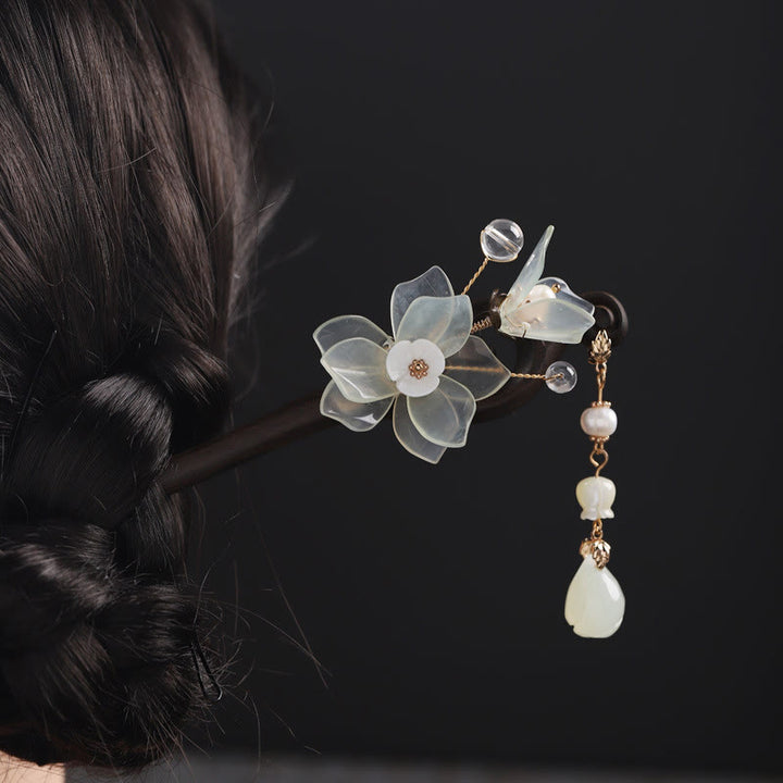 Forcina per capelli con nappa di magnolia, conchiglia, giada e pietre Buddha Stones