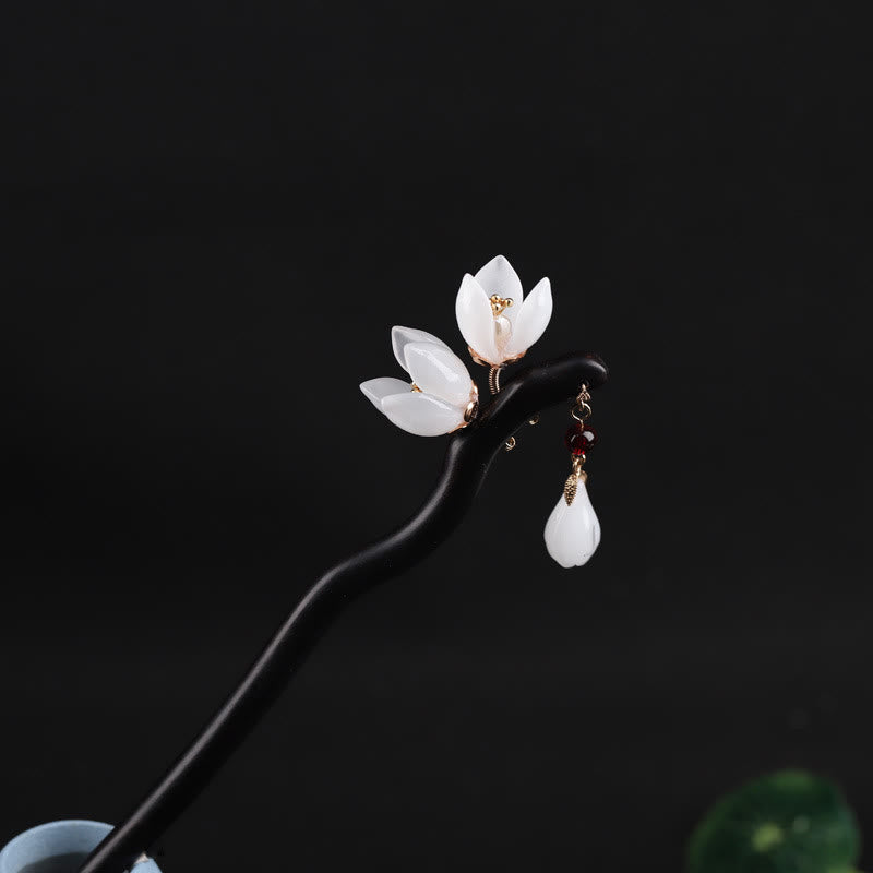 Forcina per capelli con petali di fiori di magnolia in ebano Buddha Stones