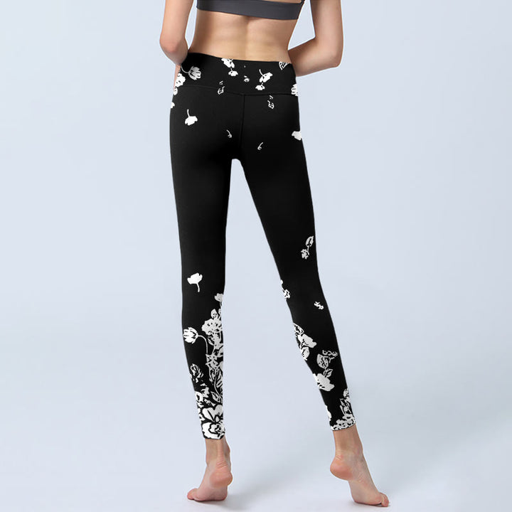 Leggings da palestra con stampa di petali sparsi neri Buddha Stones da donna, pantaloni da yoga