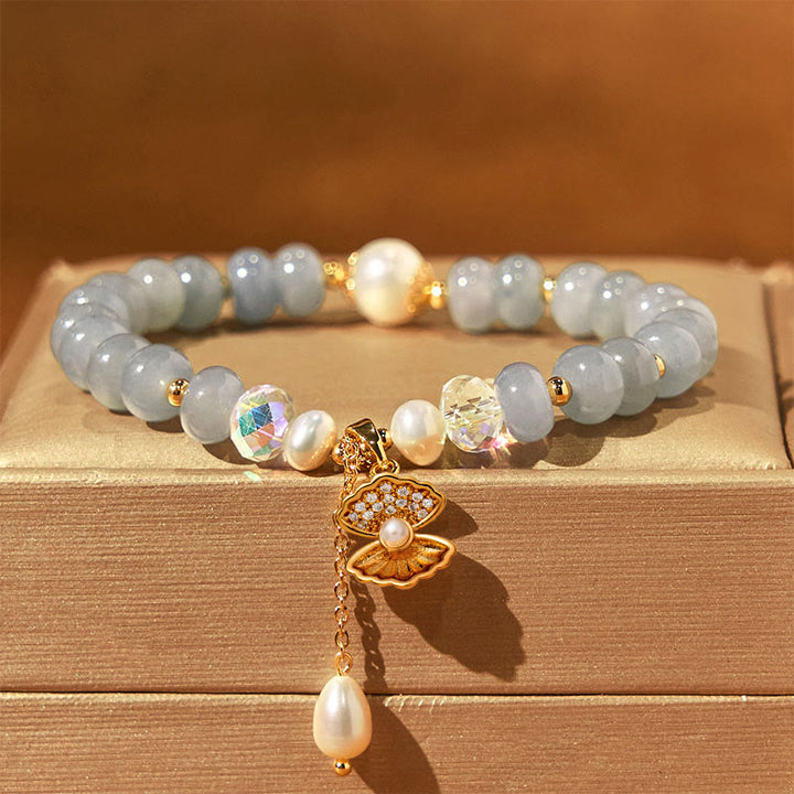 Braccialetto di perle curative in conchiglia di perle di acquamarina naturale Buddha Stones