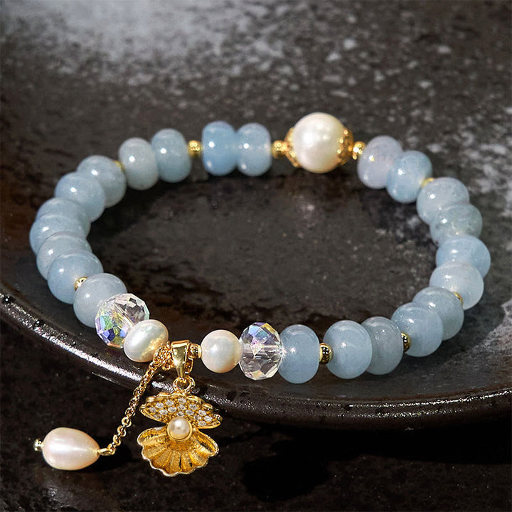 Braccialetto di perle curative in conchiglia di perle di acquamarina naturale Buddha Stones