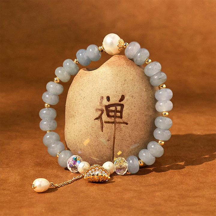 Braccialetto di perle curative in conchiglia di perle di acquamarina naturale Buddha Stones