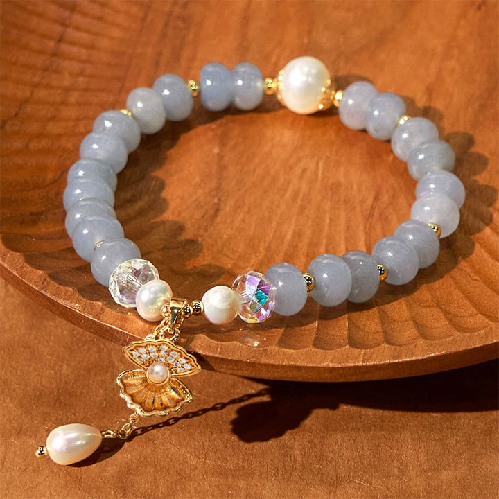 Braccialetto di perle curative in conchiglia di perle di acquamarina naturale Buddha Stones