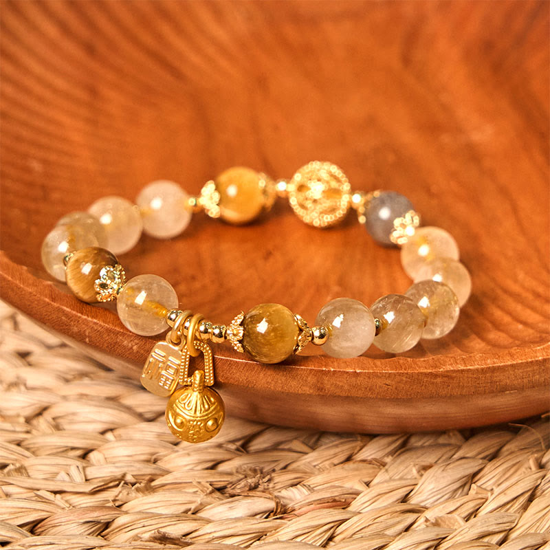 Braccialetto di auspicio Buddha Stones in quarzo rutilato naturale Fu Character Metal che ingoia la bestia