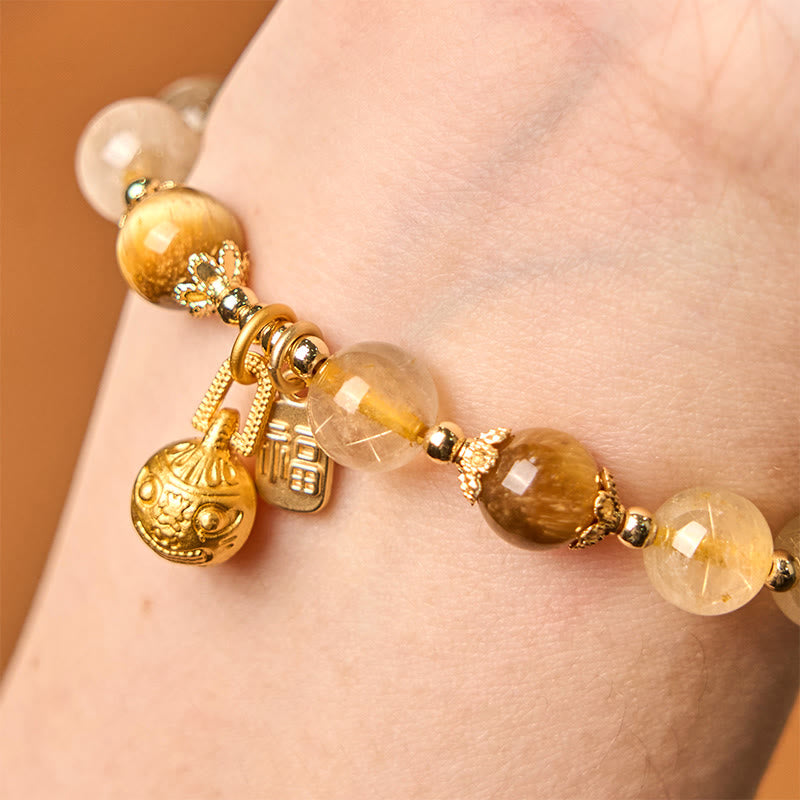 Braccialetto di auspicio Buddha Stones in quarzo rutilato naturale Fu Character Metal che ingoia la bestia