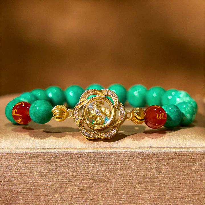 Braccialetto della prosperità con ciondolo ciclone Om Mani Padme Hum in giada naturale Buddha Stones