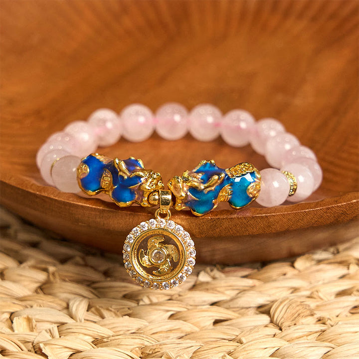 Braccialetto con ciondolo a forma di ciclone PiXiu Buddha Stones e cristallo rosa che cambia colore - Bracciale Pixiu in cristallo rosa (circonferenza del polso: 15-17 cm) - image 0