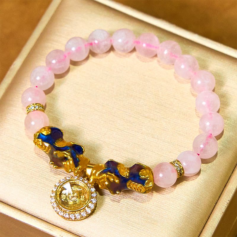 Braccialetto con ciondolo a forma di ciclone PiXiu Buddha Stones e cristallo rosa che cambia colore
