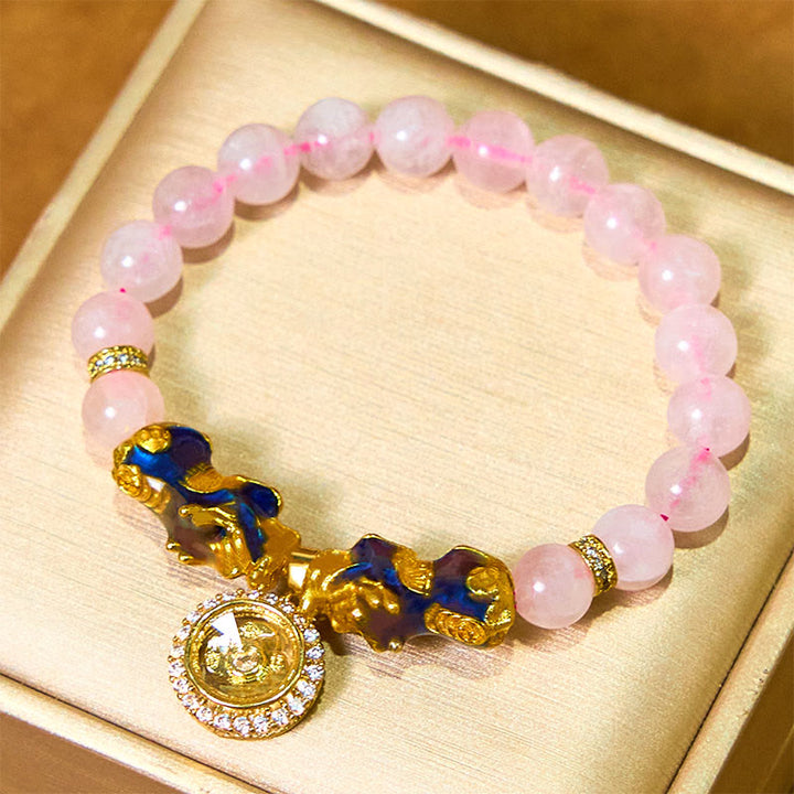 Braccialetto con ciondolo a forma di ciclone PiXiu Buddha Stones e cristallo rosa che cambia colore
