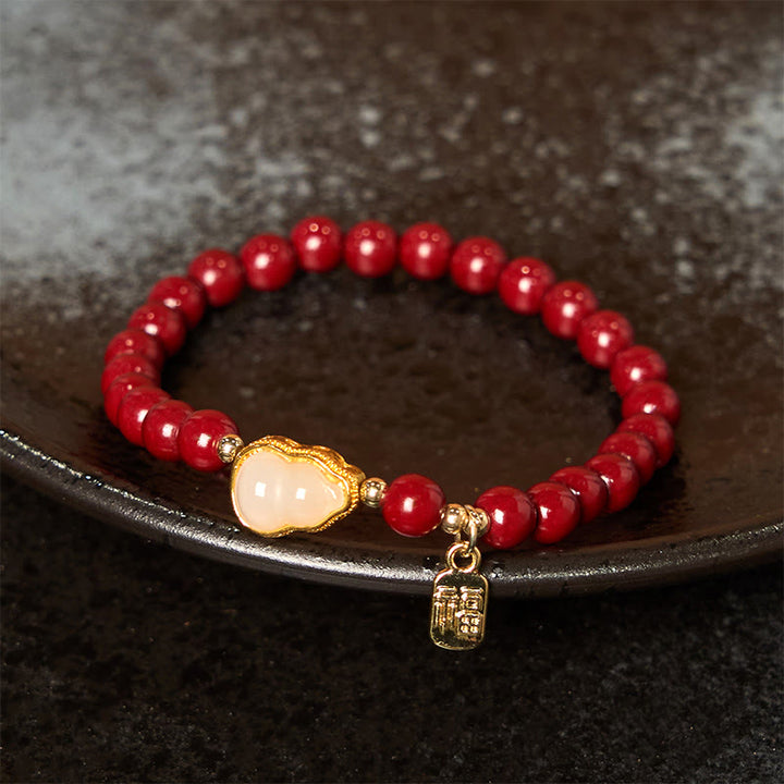 Braccialetto di benedizione con ciondolo Fu, carattere zucca e cinabro Buddha Stones