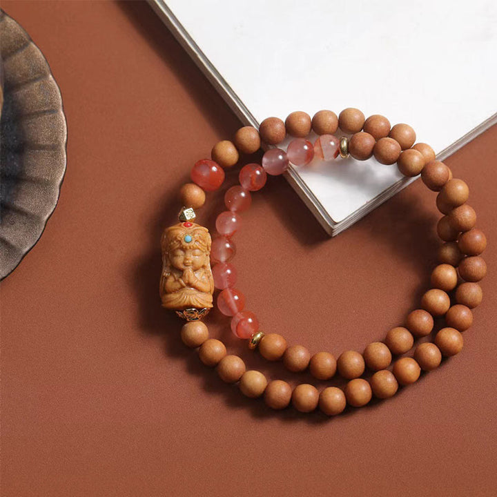 Bracciale della fortuna in agata rossa del sud, sandalo e Buddha Stones tibetane Zakiram, dea della ricchezza