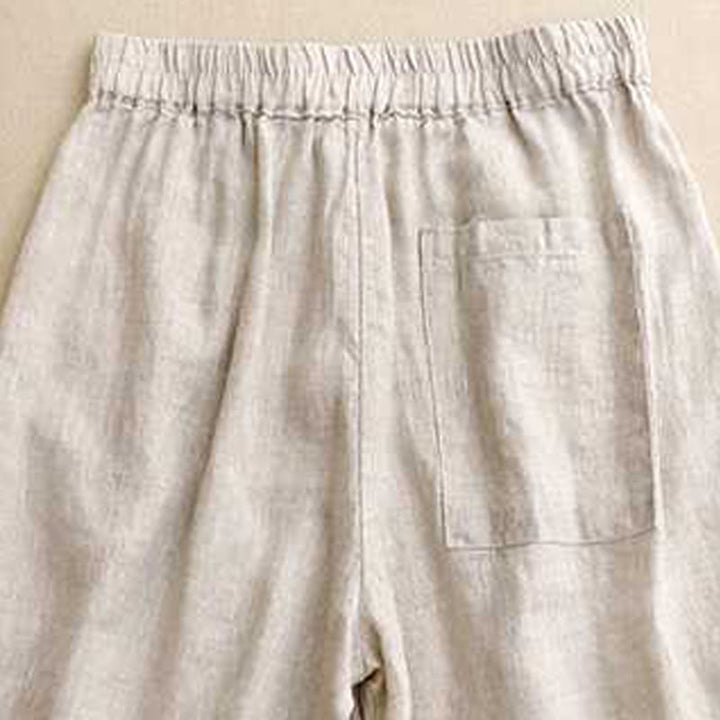 Pantaloncini da donna estivi casual con cerniera, bottoni a rana e tasche, con stampa Buddha Stones. - image 13