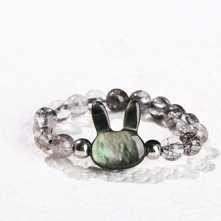 Buddha Stones 3 mm Quarzo rutilato nero Tridacna Anello Coniglio Gatto - Coniglio (corda elastica da 63 mm) - image 1