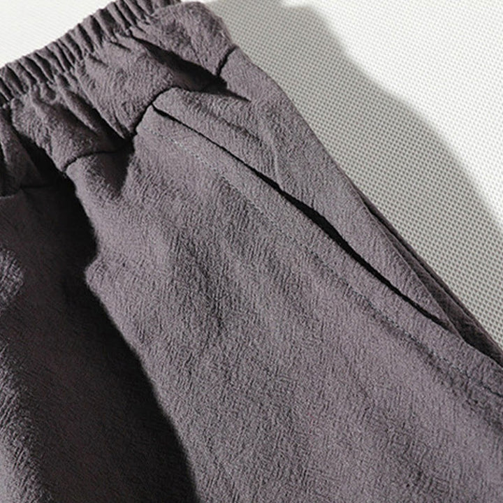 Set di abbigliamento da meditazione da uomo con motivo Buddha Stones , composto da t-shirt semplice con colletto a revers e pantaloncini a gamba larga con tasche. - image 13