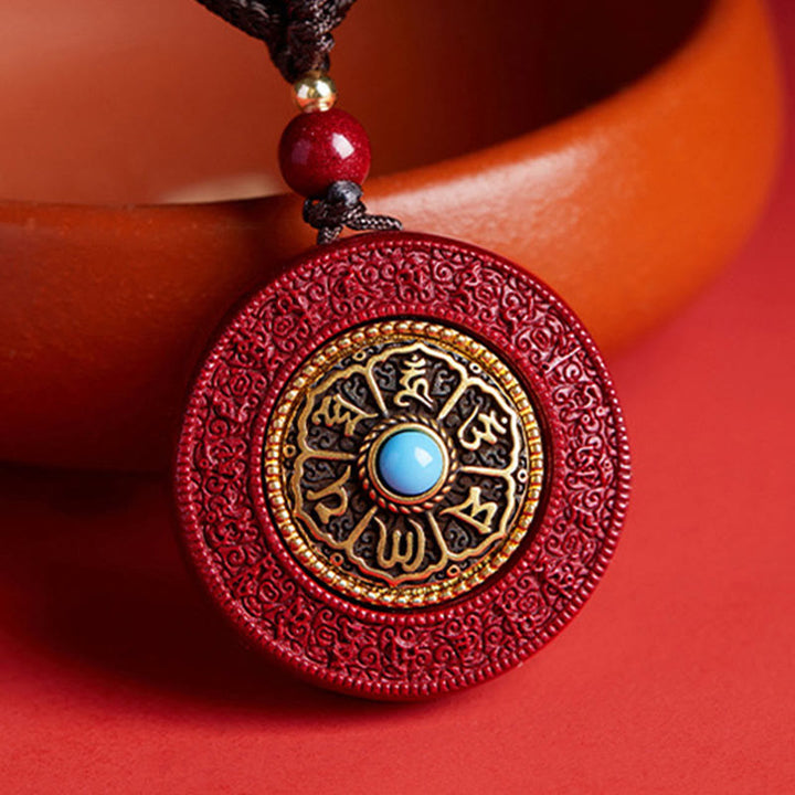 Collana con ciondolo a corda con motivo Yin Yang e scrittura girevole in cinabro naturale Om Mani Padme Hum, Buddha Stones.