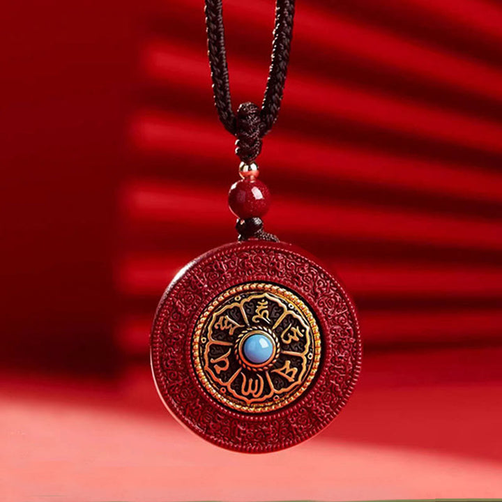 Collana con ciondolo a corda con motivo Yin Yang e scrittura girevole in cinabro naturale Om Mani Padme Hum, Buddha Stones.