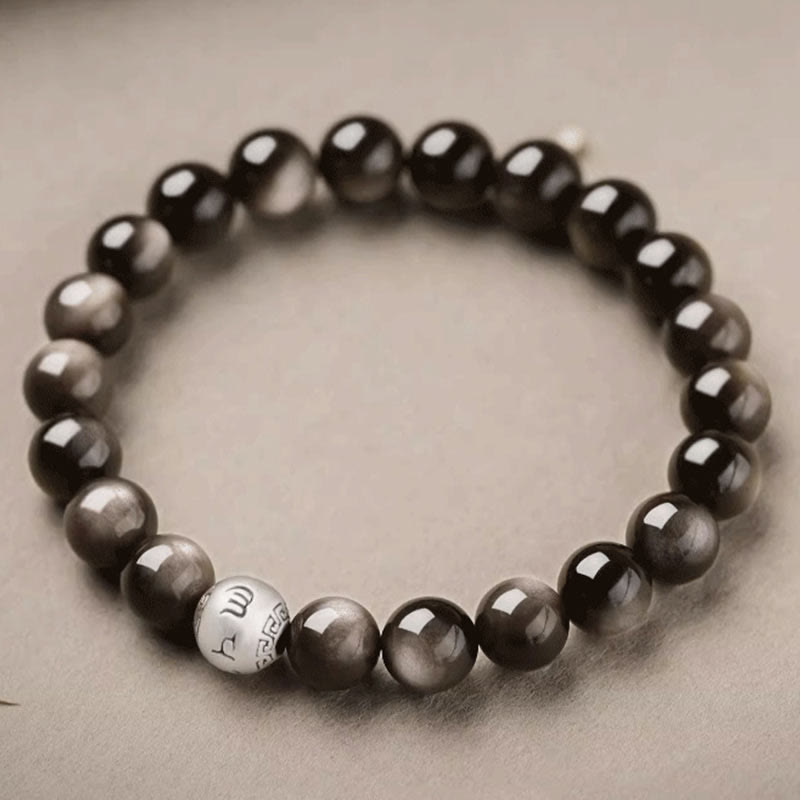 Bracciale di protezione Om Mani Padme Hum in ossidiana naturale lucida e argento Buddha Stones