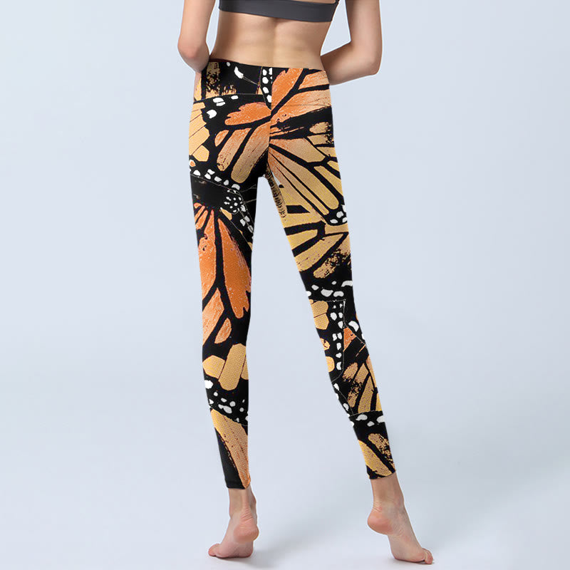 Leggings da yoga da donna con stampa di farfalle gialle Buddha Stones