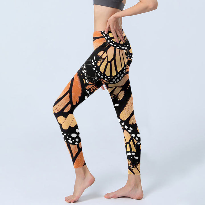 Leggings da yoga da donna con stampa di farfalle gialle Buddha Stones