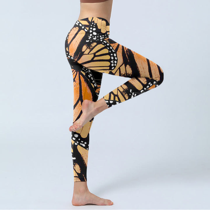 Leggings da yoga da donna con stampa di farfalle gialle Buddha Stones