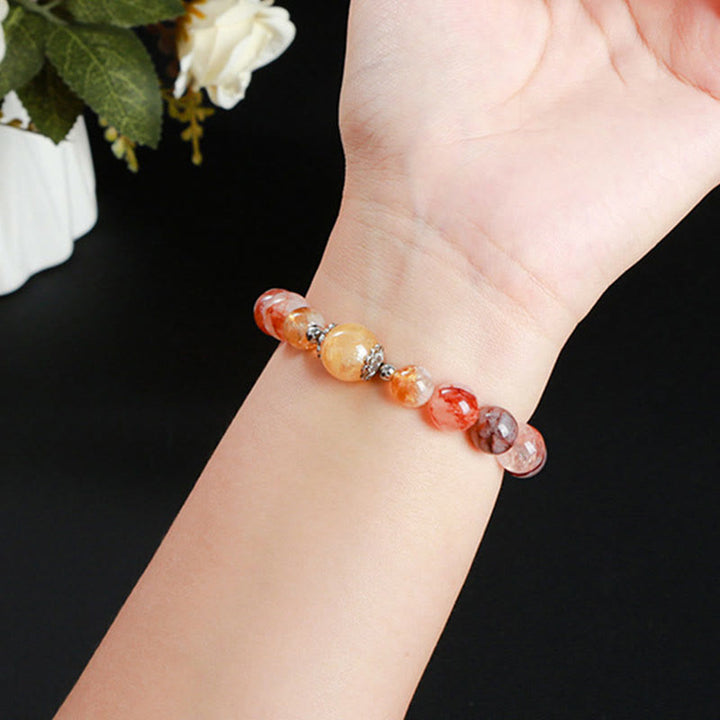 Braccialetto di equilibrio con perle di quarzo ematoide rosso naturale Buddha Stones