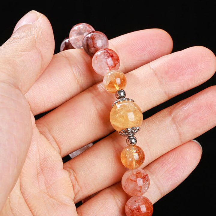 Braccialetto di equilibrio con perle di quarzo ematoide rosso naturale Buddha Stones
