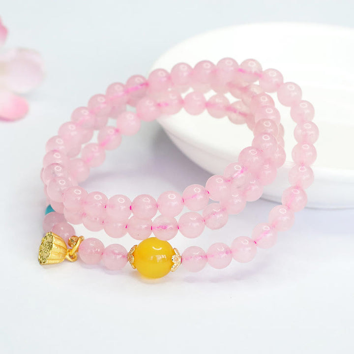 Bracciale Buddha Stones con cristalli rosa e calcedonio giallo multi-cerchio, calore del loto - image 1