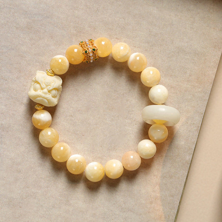 Bracciale Buddha Stones Ambra Grigio Agata Avorio Frutta Confidenza