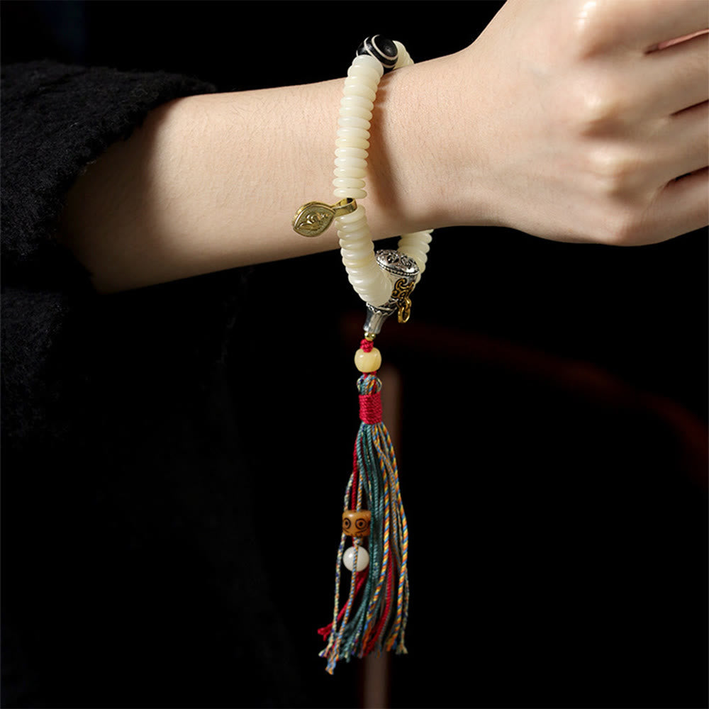 Bracciale Mala da polso con nappa della saggezza in pietra naturale bianca Bodhi di Buddha Stones