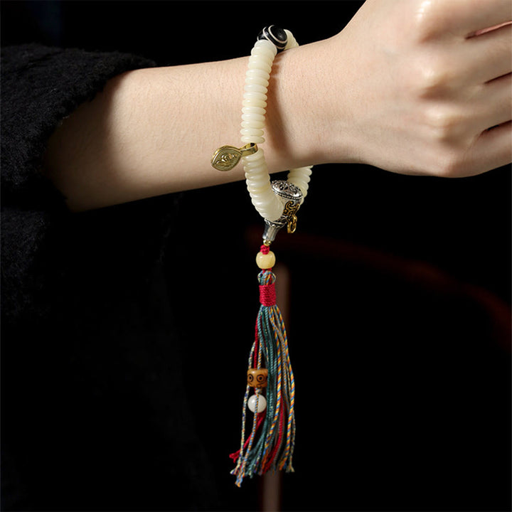 Bracciale Mala da polso con nappa della saggezza in pietra naturale bianca Bodhi di Buddha Stones