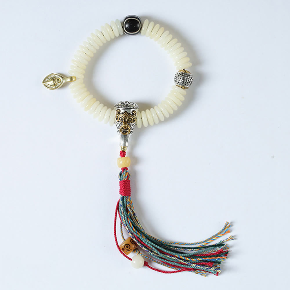 Bracciale Mala da polso con nappa della saggezza in pietra naturale bianca Bodhi di Buddha Stones