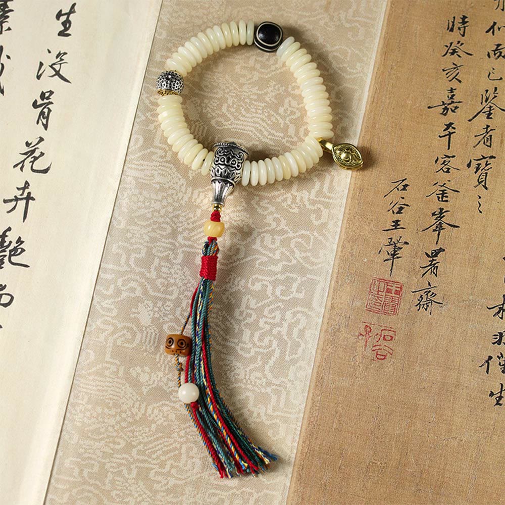 Bracciale Mala da polso con nappa della saggezza in pietra naturale bianca Bodhi di Buddha Stones
