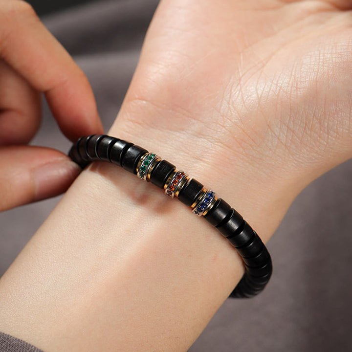 Bracciale della pace con zirconi, piccole foglie di sandalo rosso e Buddha Stones in legno di ebano