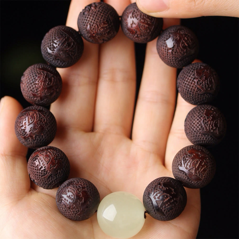 Braccialetto PiXiu Warmth con incisione in palissandro tibetano Buddha Stones
