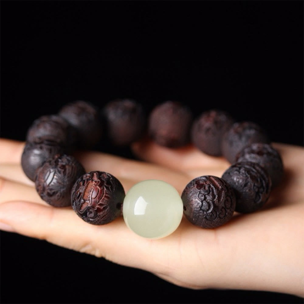 Braccialetto PiXiu Warmth con incisione in palissandro tibetano Buddha Stones