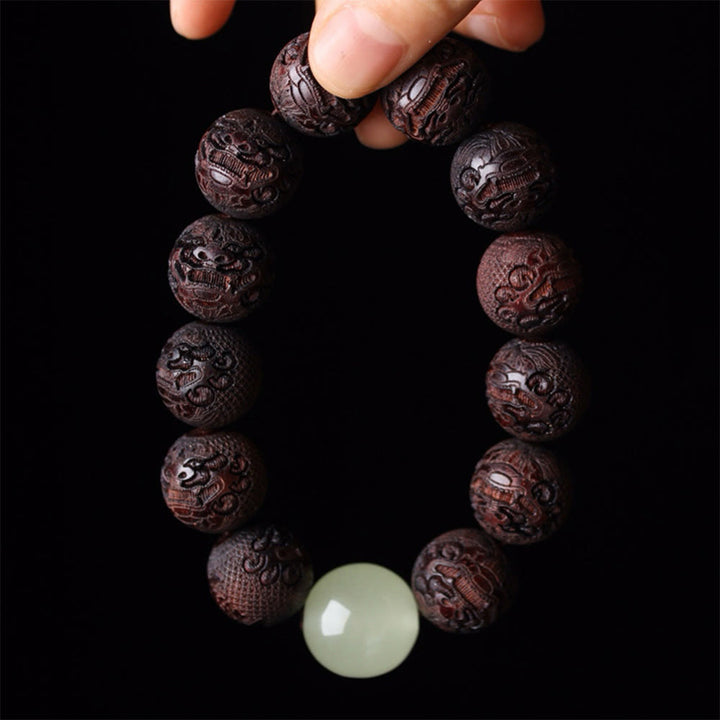 Braccialetto PiXiu Warmth con incisione in palissandro tibetano Buddha Stones
